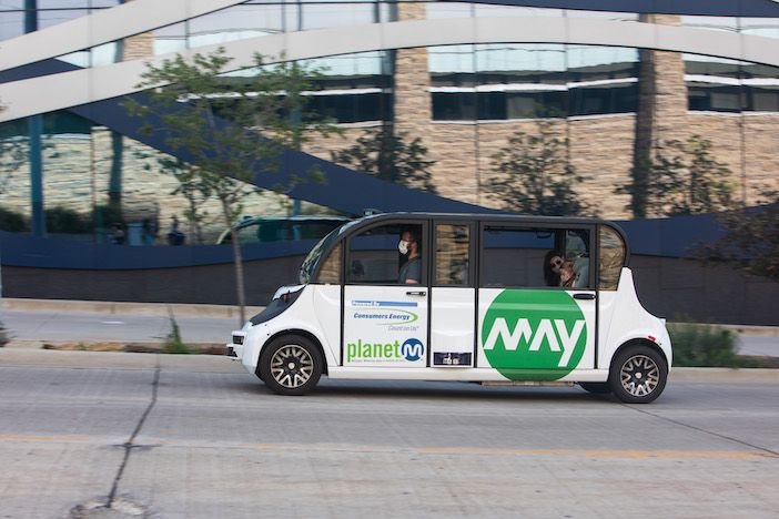 Passengers inside an autonomous vehicle designed for ride-hailing.