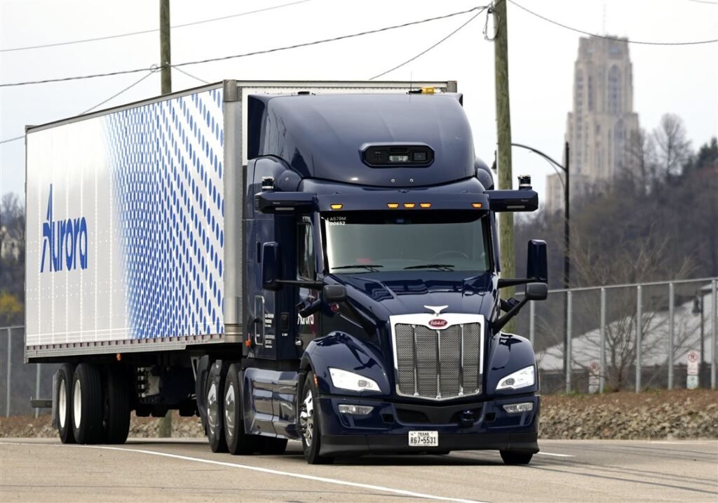 The US exemption allows qualifying Level 4 autonomous trucks to use cab-mounted warning beacons instead of traditional roadside warning devices.