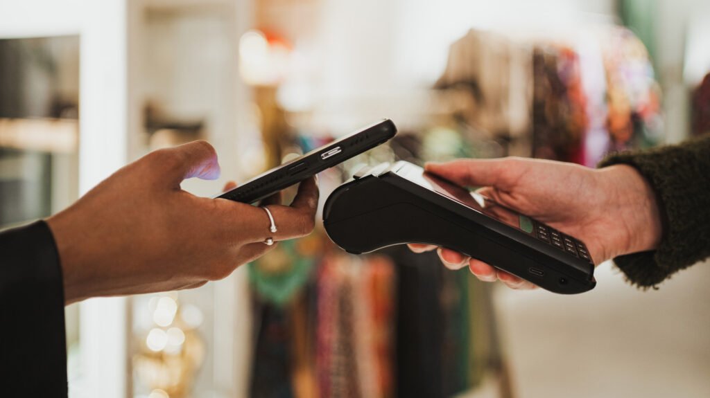 UK Proposes Opening iPhone NFC Access to Apple Pay Rivals Smartphone contactless payment amid debate over iPhone NFC access.
